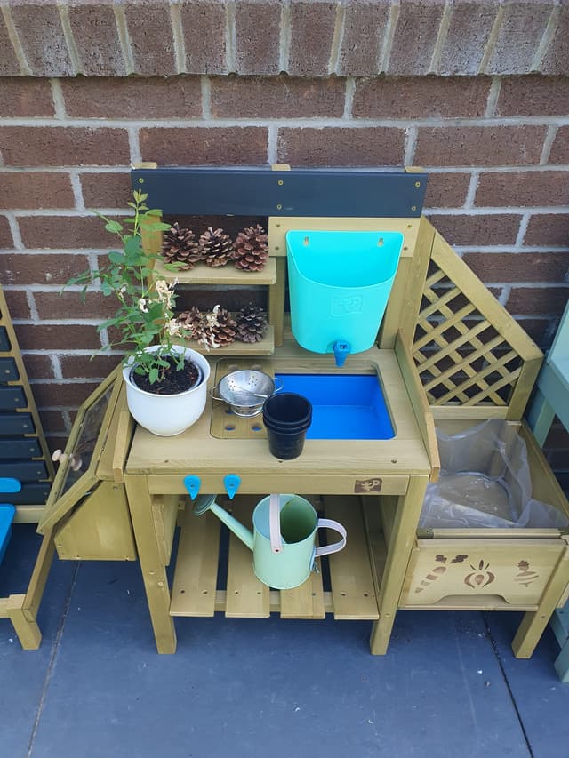 Gardening and mud kitchen play